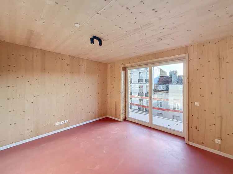 Appartement te koop in Molenbeek-St-Jean met gemeenschappelijke ruimtes