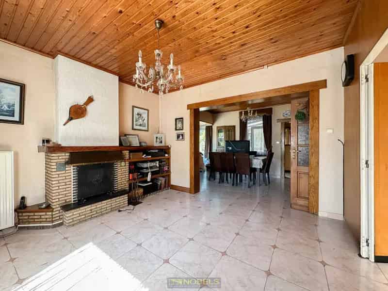 Halfopen Woning te Schorisse met Potentieel en Tuin