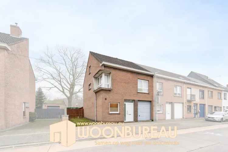 Te koop ruime halfopen bebouwing in Lokeren met 4 slaapkamers en tuin