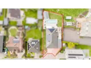 Huis te koop Melsele - Energiezuinig gerenoveerde woning met zwembad