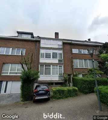 Opbrengsteigendom met Garage en Tuin te Vervloesemstraat
