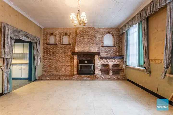 Huis te koop in Dendermonde: Zuidgerichte tuin en ruime garage