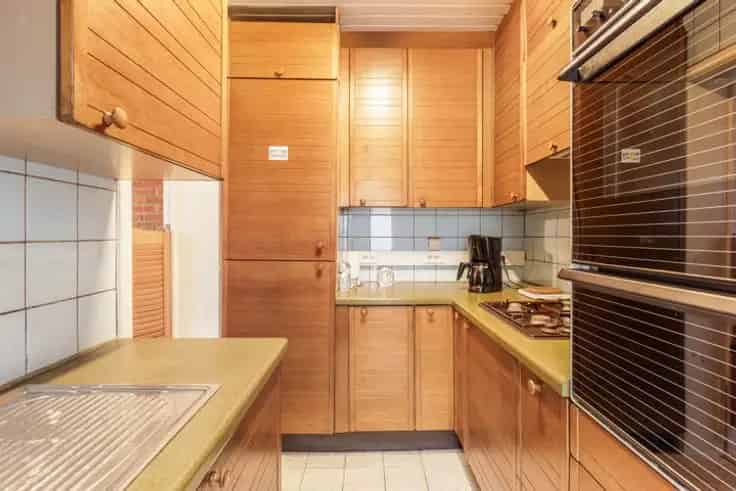 Te renoveren 3-gevel woning Jette met tuin en garage