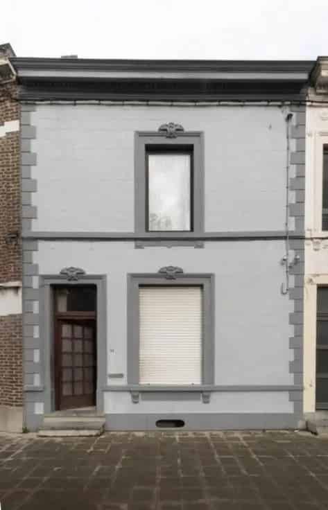 Huis te koop: Twee-fronts woning met binnenplaats