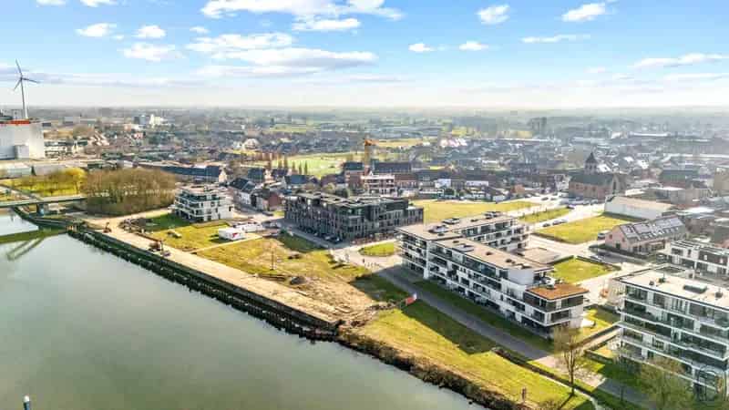 Appartement te huur aan de Leie: 2 slaapkamers, terras en tuin