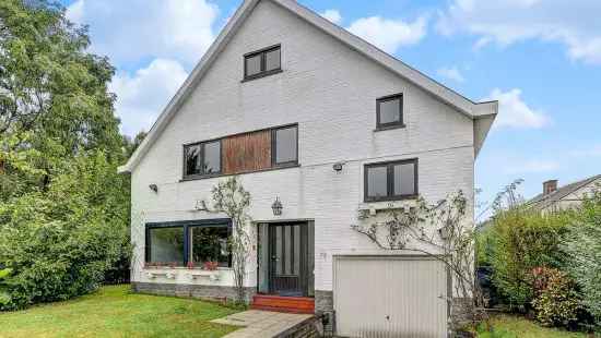 Te moderniseren villa met 6 slpk, garage en tuin