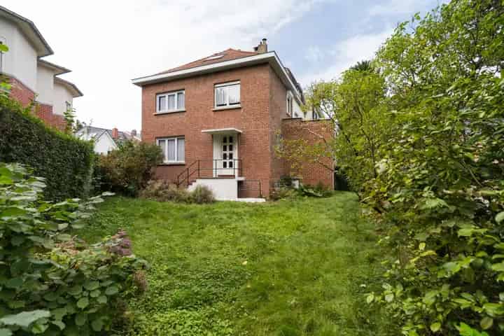 Halfopen woning te Oud Stockel - 110m² - Tuin - Garage
