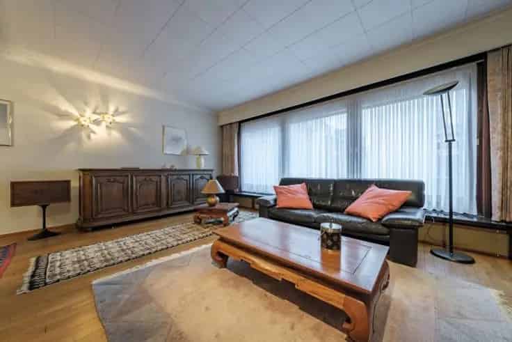 Huis te koop Bornem: gerenoveerde woning met garage en uitweg