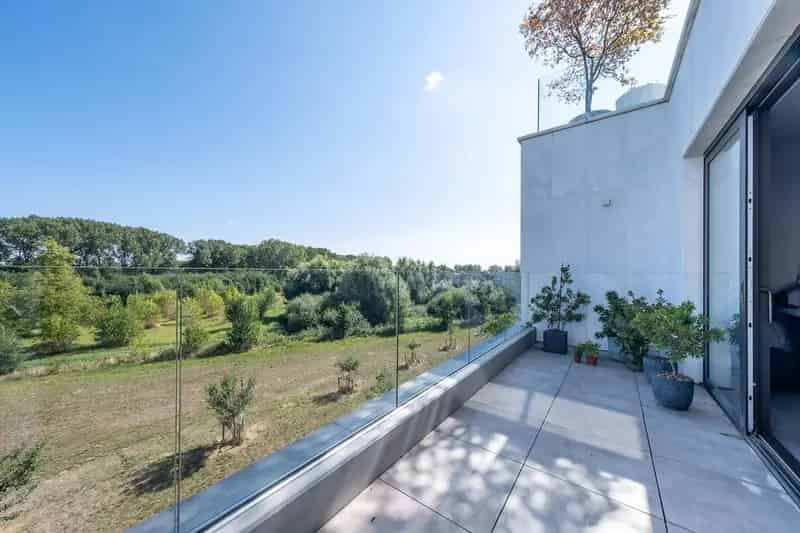 Nieuwbouwappartement te huur Melsele - Uitzicht geboortebos