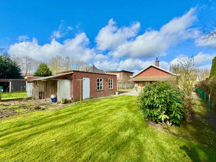 Huis te koop alleenstaande bungalow met tuin in Wippelgem