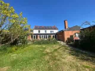 Huis te koop 3 gevels met tuin en 2 verhuureenheden
