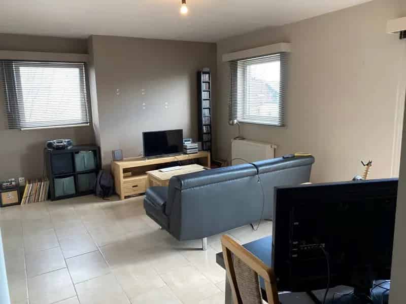 Appartement te koop Merelbeke:  Lichtrijk appartement met parking en kelder