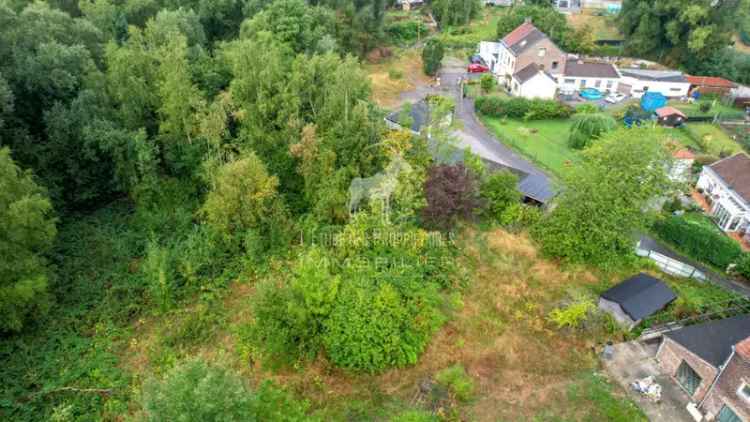 Te koop bouwgrond in Roux, rustig gelegen nabij winkels