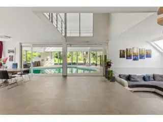 Villa te koop Brasschaat - Ruime woning met binnenzwembad