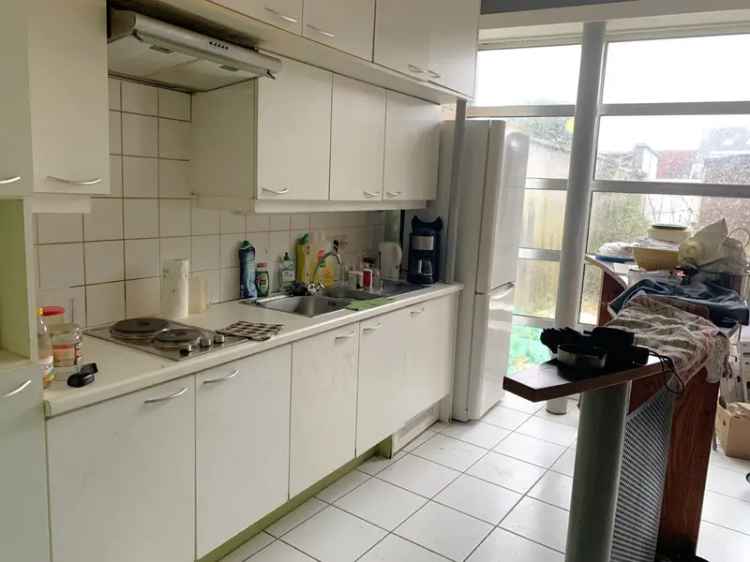 Handelspand/appartement  met grote stadstuin op ideale ligging (Mobiscore 9/10!)!