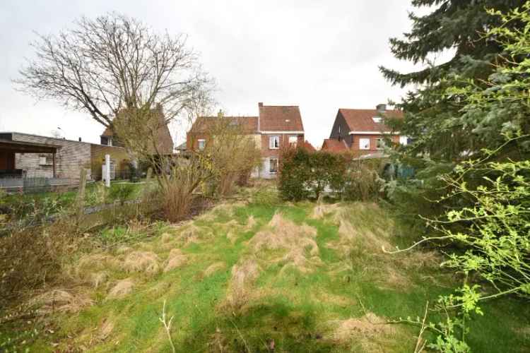 Huis te koop in Kuurne - Licht op te frissen halfopen woning met tuin