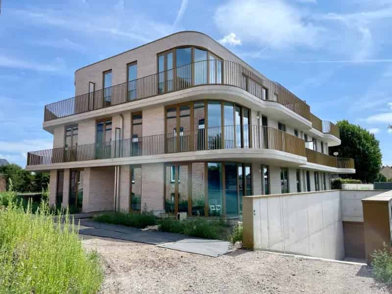Appartement te koop Puurs: 1 slaapkamer, tuin, autostaanplaats