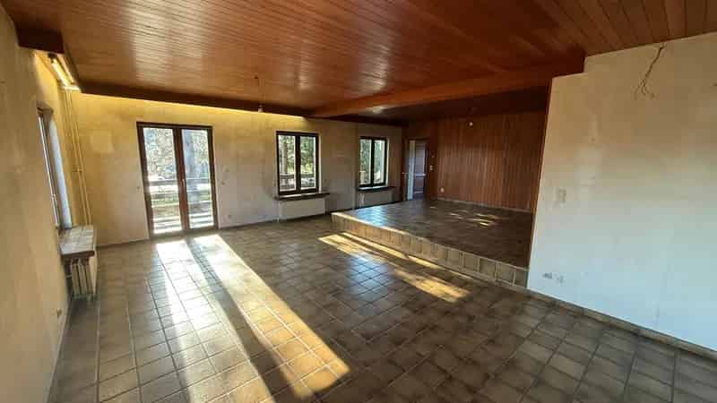 Woning met loods en weiland