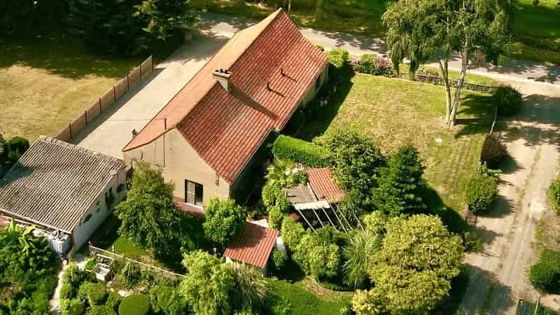 Huis te koop Kaprijke: Landelijke hoeve met landbouwgrond