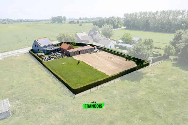 Huis te huur Sint-Laureins: gerenoveerde woning met 4 slaapkamers en stalling