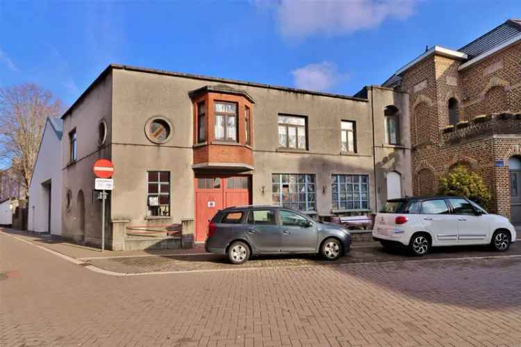 Te renoveren huis met grote garage in België