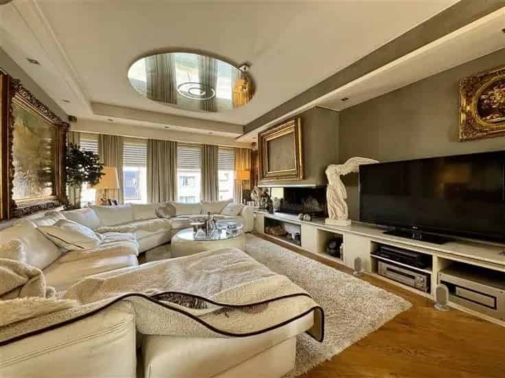 Duplexappartement te Koop: Ruime woning met garage en terras