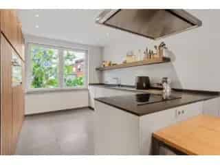 Huis te Koop Deurne - Instapklare Bel-Etage met Garage en Stadstuin