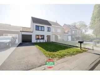 Huis te koop Assebroek - Instapklare gezinswoning met garage en tuin