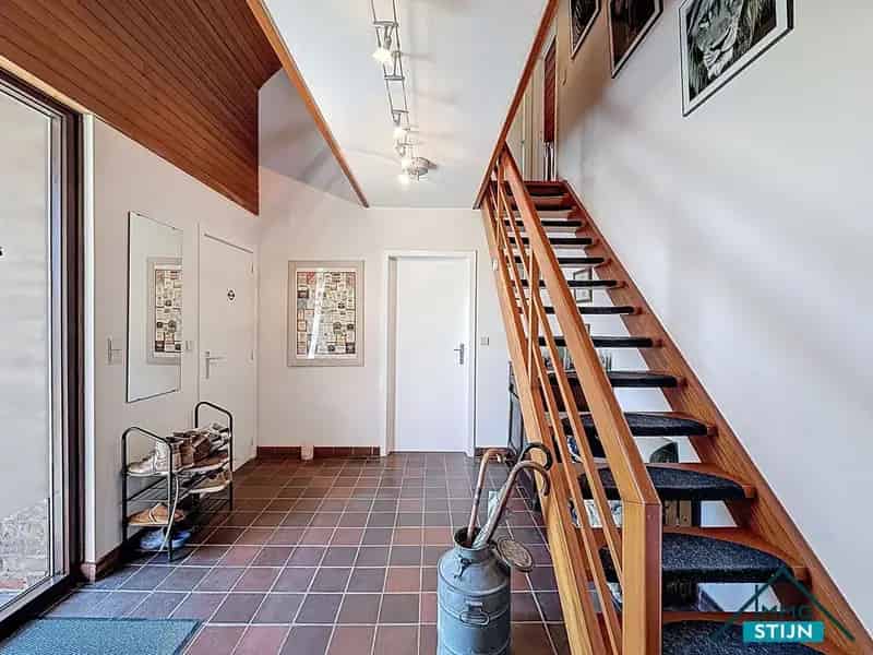 Woning met zongerichte tuin