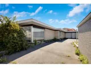 Bouwgrond met woning te koop Oudegem