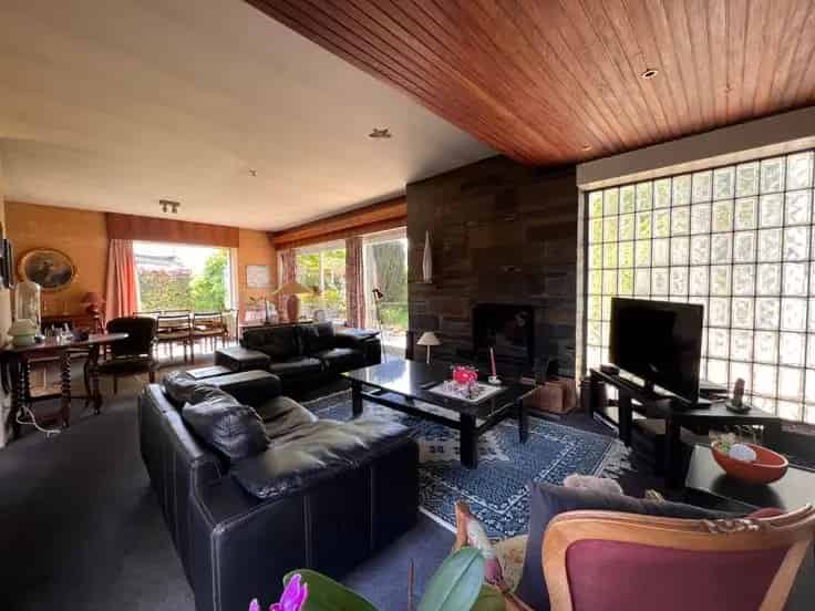 Huis Te Koop Te renoveren woning met tuin en garage