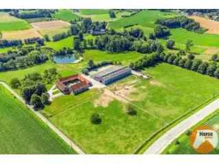 Fermette te koop Nukerke - Unieke Vierkantshoeve met Binnenzwembad en Paardenstallen