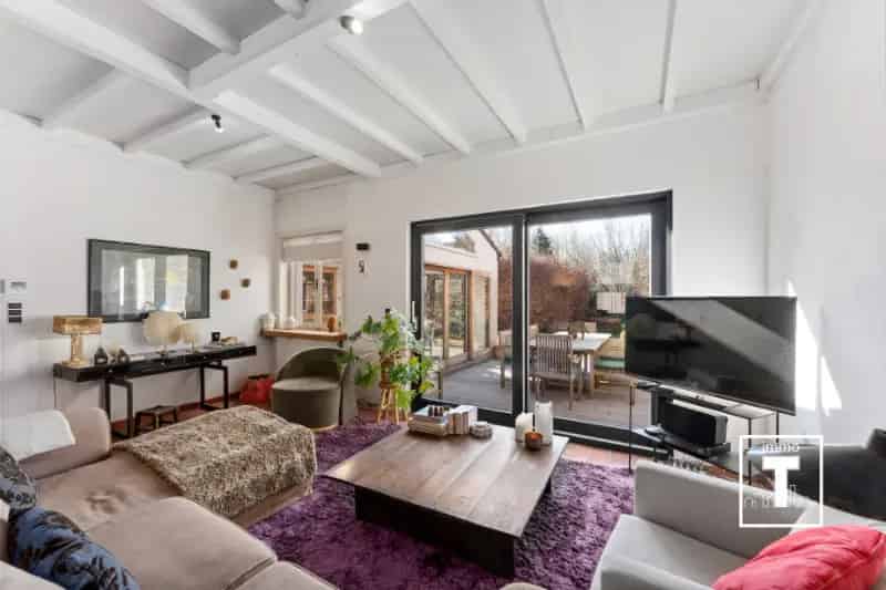 Huis te koop Kruisem centrum: Instapklare herenwoning met garage en tuin