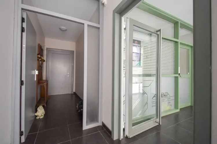 Ruim polyvalent pand winkel en woonst Oedelem
