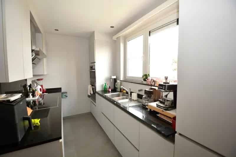 Dakappartement te koop Wommelgem 1 slaapkamer ruim terras