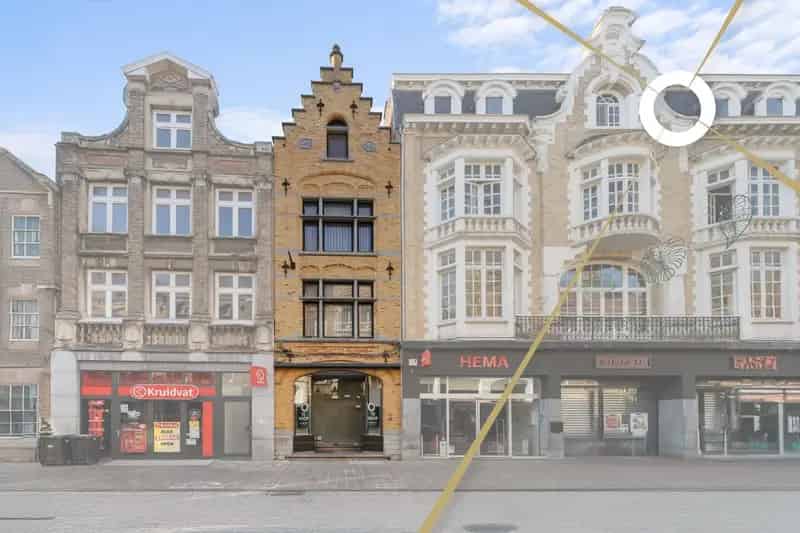 Prominent handelspand met woonst in het hartje van Ieper