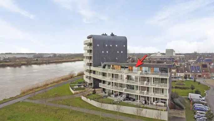 Te koop dakappartement in Niel met 2 slaapkamers en terras