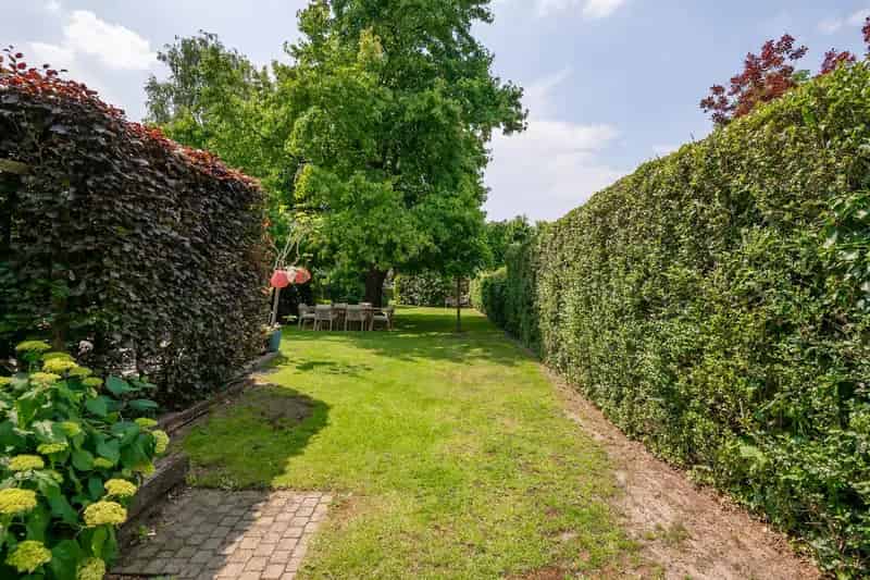 Huis te koop: Charmante woning met ruim perceel en bijgebouw