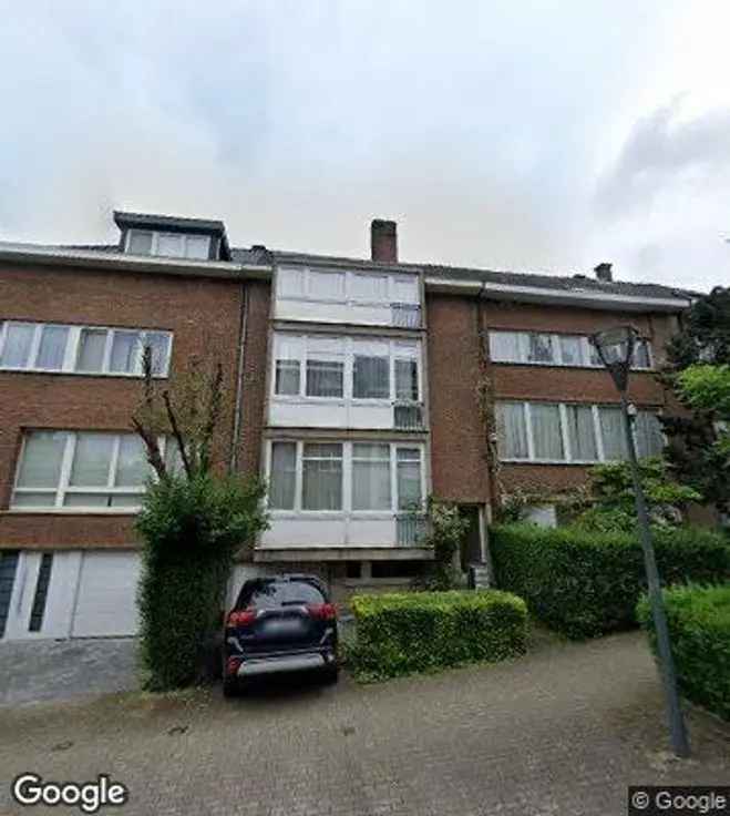 Huis Te Koop met Garage en Tuin - Opbrengsteigendom