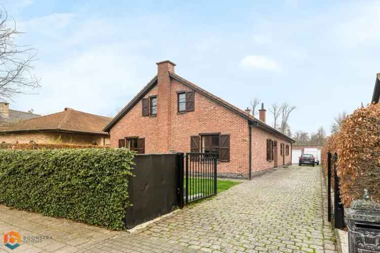 Woning met ruime tuin en 3 slpkrs te Putte