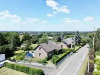 Huis te koop Housse 254m² 4 slaapkamers 2 garages
