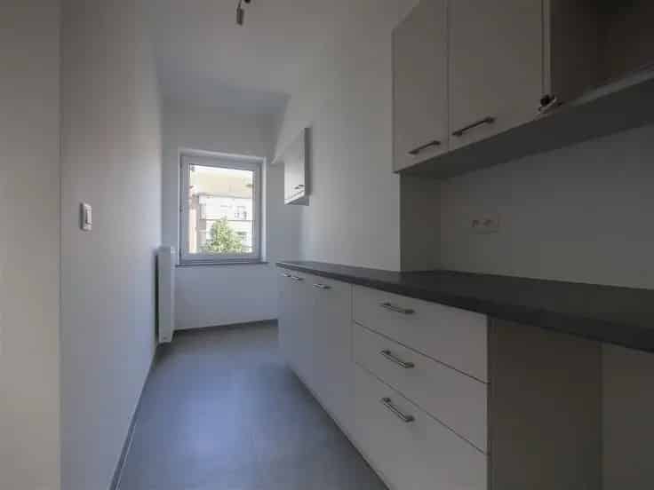 Appartement 2 slaapkamers Molenbeek gerenoveerd