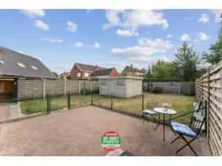 Huis te koop Assebroek: Rustige woning met tuin en garage