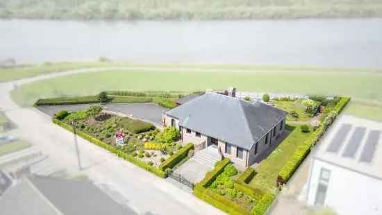 Unieke villa te koop met zicht op de Schelde