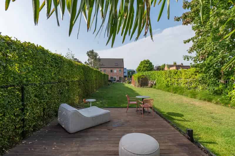 Huis te koop: Trendy halfopen bebouwing met grote tuin