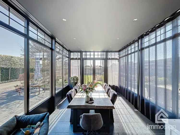 Huis te koop Achel: Luxe woning met bedrijfshal en dubbele garage