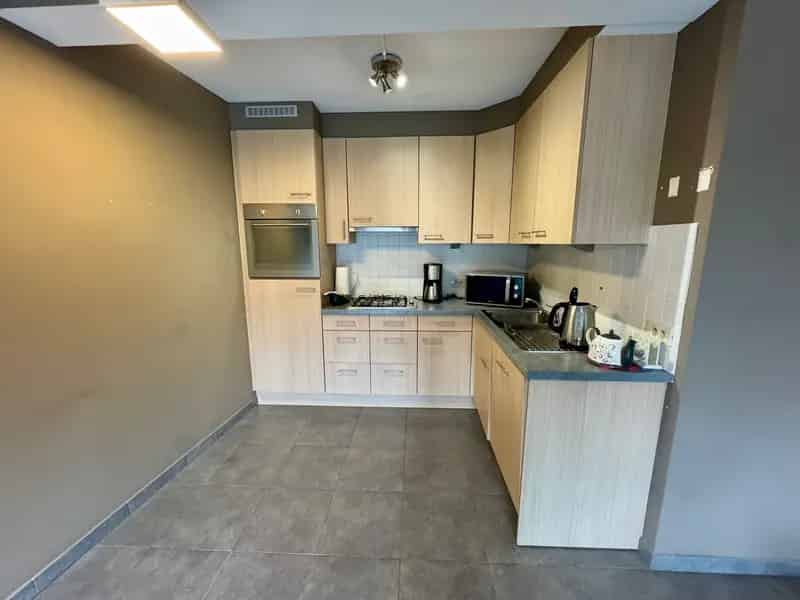 Appartement met 2 slaapkamers en autostaanplaats in centrum Ruddervoorde