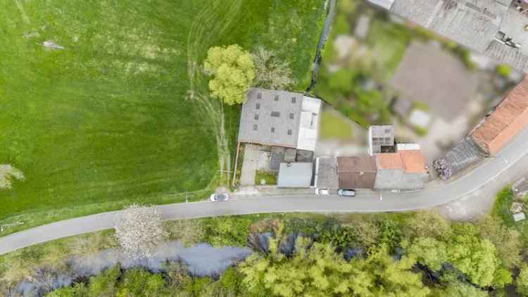 Huis te koop met loods aan de Schelde