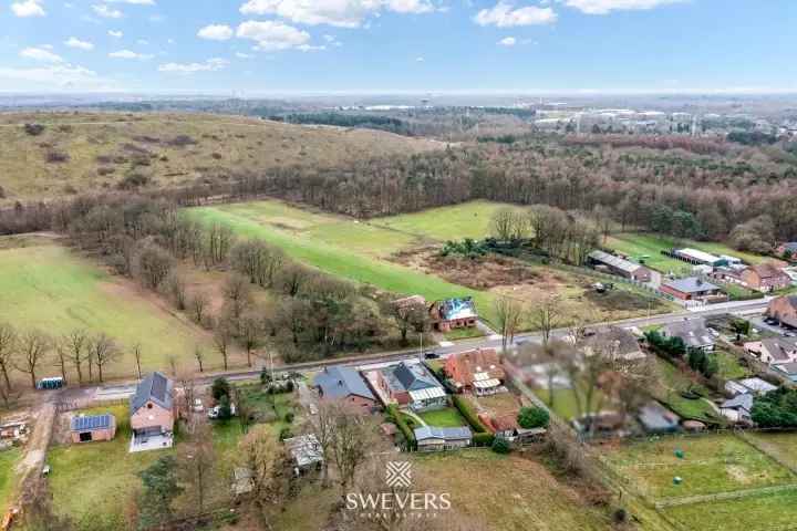 Uniek gelegen en te renoveren woning op 50 are aan de mijnterril van Heusden-Zolder