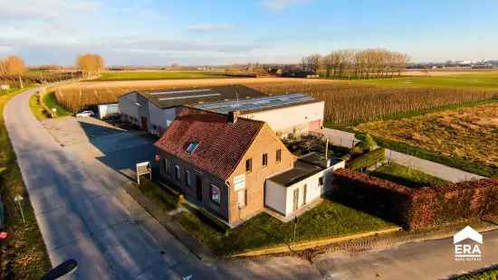 Ruime woning en loods met winkelruimte | ERA Domus